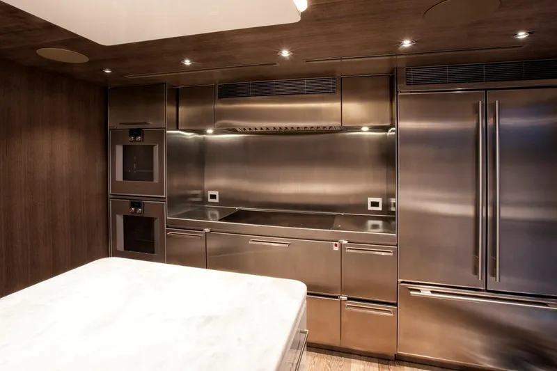 Slide: The Image of Luxurious 2018 Westport Raised Pilothouse interior with ocean view and modern decor. - 15