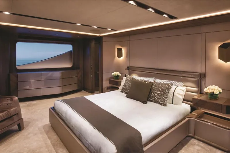 Slide: The Image of Luxurious bedroom interior of 2018 Westport Raised Pilothouse yacht with modern decor. - 21