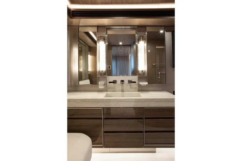 Slide: The Image of Luxurious bedroom interior of 2018 Westport Raised Pilothouse yacht with modern design and elegant lighting. - 25