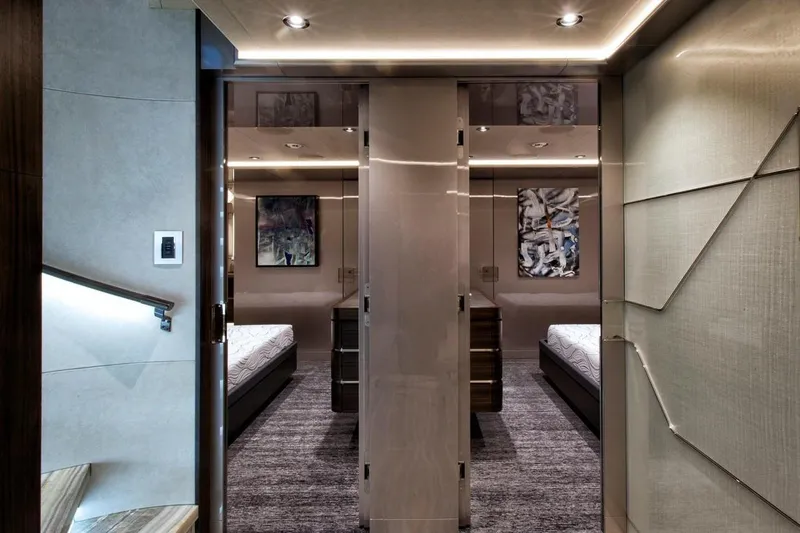 Slide: The Image of Luxurious bedroom in 2018 Westport Raised Pilothouse yacht with modern decor and ocean view. - 27