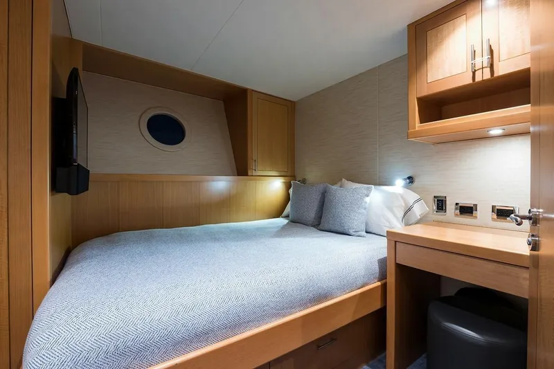 Slide: The Image of Luxurious 2018 Westport Raised Pilothouse yacht deck with bar and ocean view. - 34