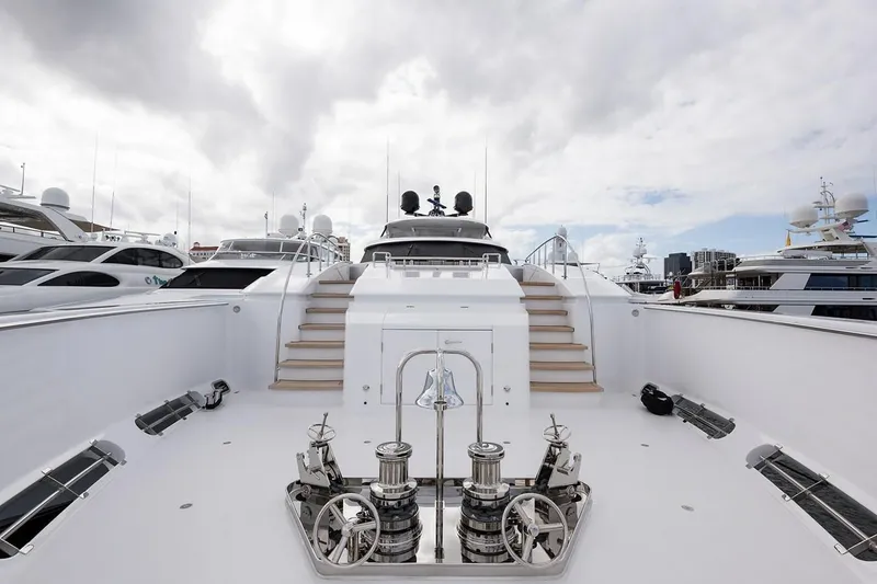 Slide: The Image of 2018 Westport Raised Pilothouse yacht helm with ocean view, featuring modern navigation equipment. - 38