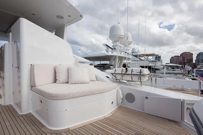 Slide: The Image of Luxurious 2018 Westport Raised Pilothouse yacht deck with elegant seating and ocean view. - 42
