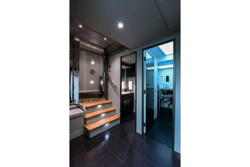 Slide: The Image of Luxurious 2018 Westport Raised Pilothouse yacht with sunshade and spacious deck, docked at marina. - 50