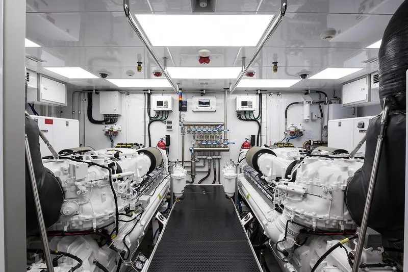 Slide: The Image of Luxurious 2018 Westport Raised Pilothouse yacht deck with ocean view and elegant dining area. - 51