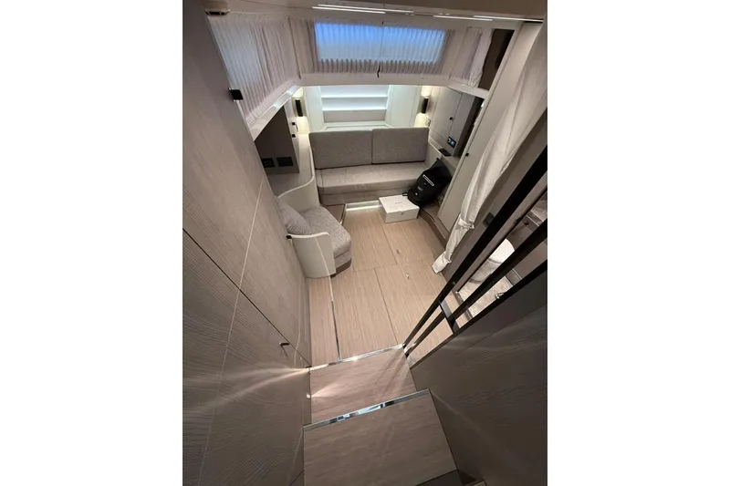 Slide: The Image of Interior of 2026 Cranchi A46 Luxury Tender, featuring modern seating and elegant design. - 20