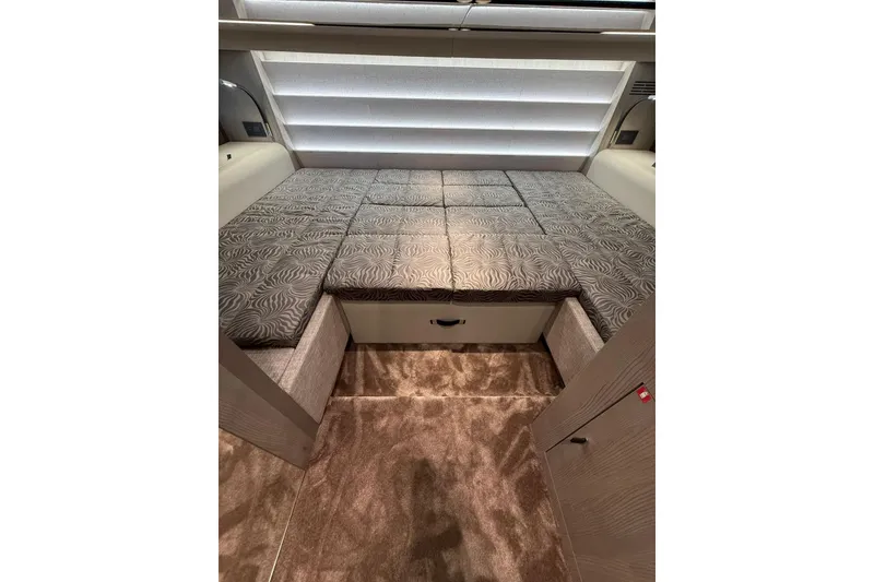 Slide: The Image of Luxurious interior cabin of 2026 Cranchi A46 Luxury Tender with elegant bedding and modern design. - 23