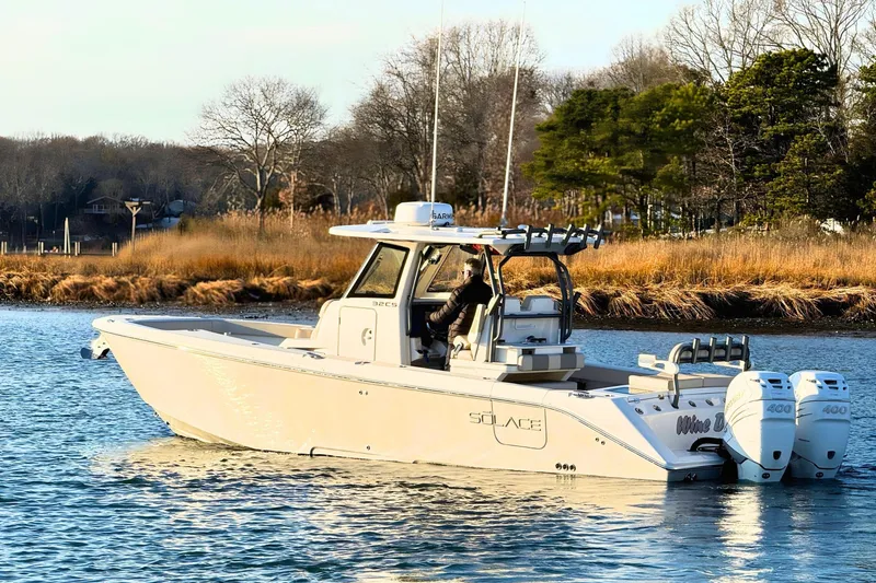 Slide: The Image of 2023 Solace 32 CS boat with Quick Gyro Stabilizer on open sea. - 0