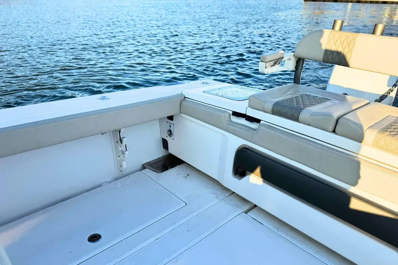 Slide: The Image of Control panel on 2023 Solace 32 CS boat, featuring a Reverso outboard flushing system. - 15
