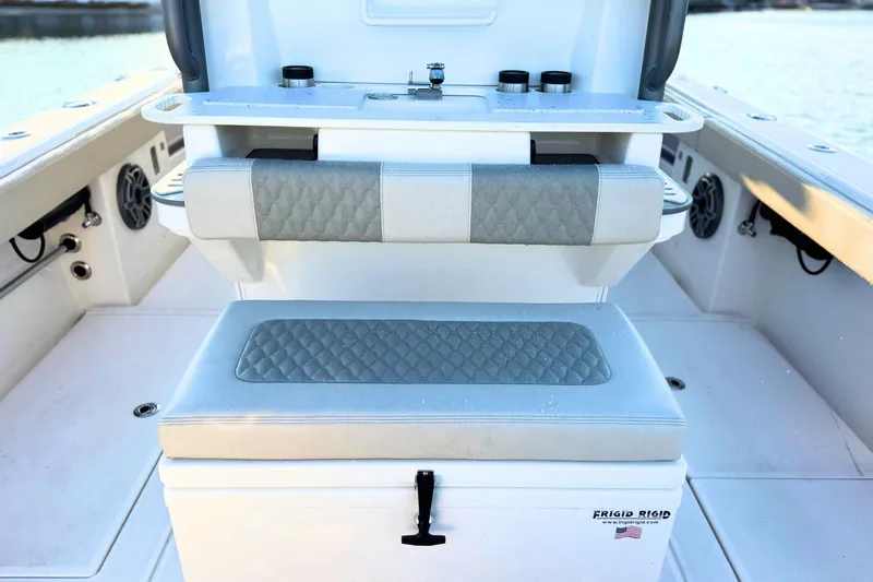 Slide: The Image of 2023 Solace 32 CS boat seat with elegant gray and white upholstery design. - 24