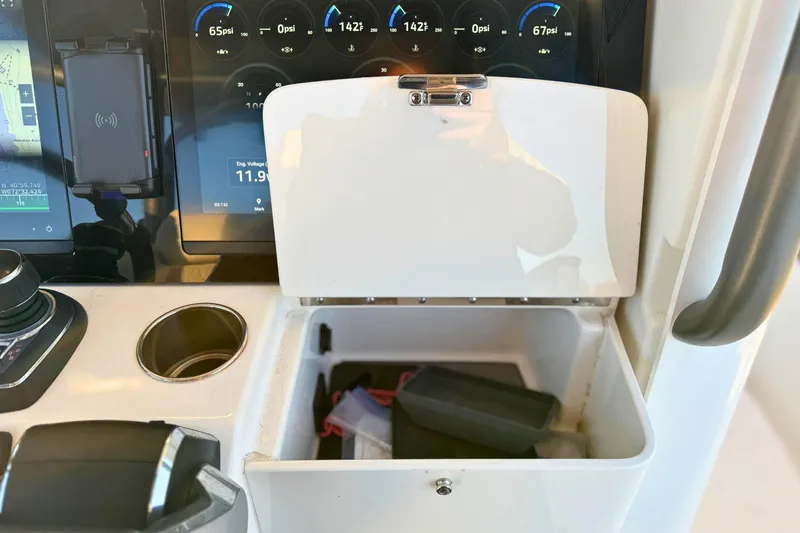 Slide: The Image of Boat communication device on 2023 Solace 32 CS, overlooking serene water view. - 39