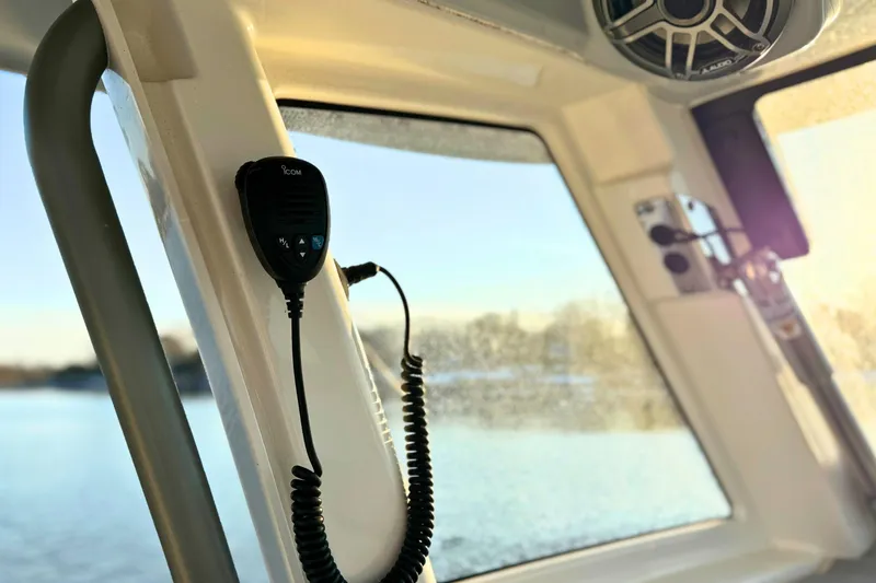 Slide: The Image of 2023 Solace 32 CS boat speakers with sunlight reflection. - 41