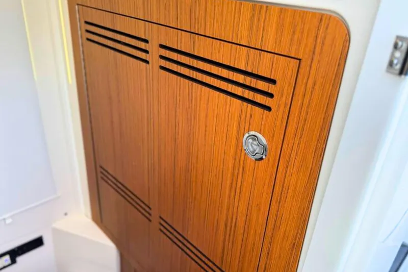 Slide: The Image of Interior of 2023 Solace 32 CS boat with seating and table. - 57