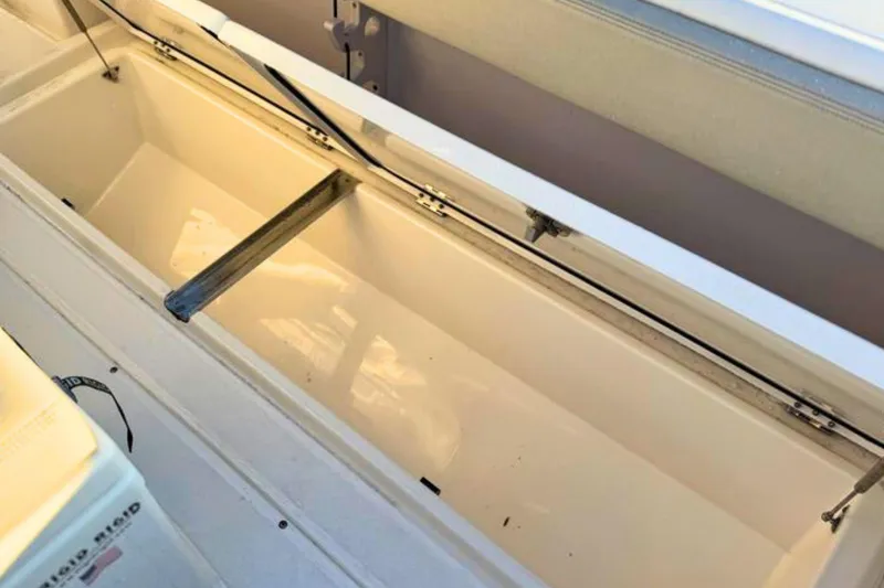 Slide: The Image of Manufacturer Provided Image: 2022 Solace 32 CS boat side view with dual outboard motors. - 64