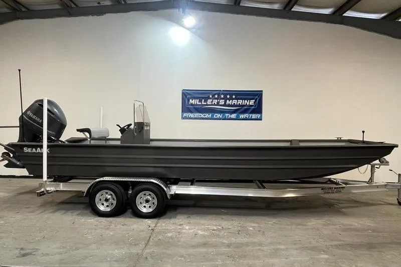 The Image of 2025 SeaArk 2472 CUB boat on trailer at Miller's Marine showroom. - 0