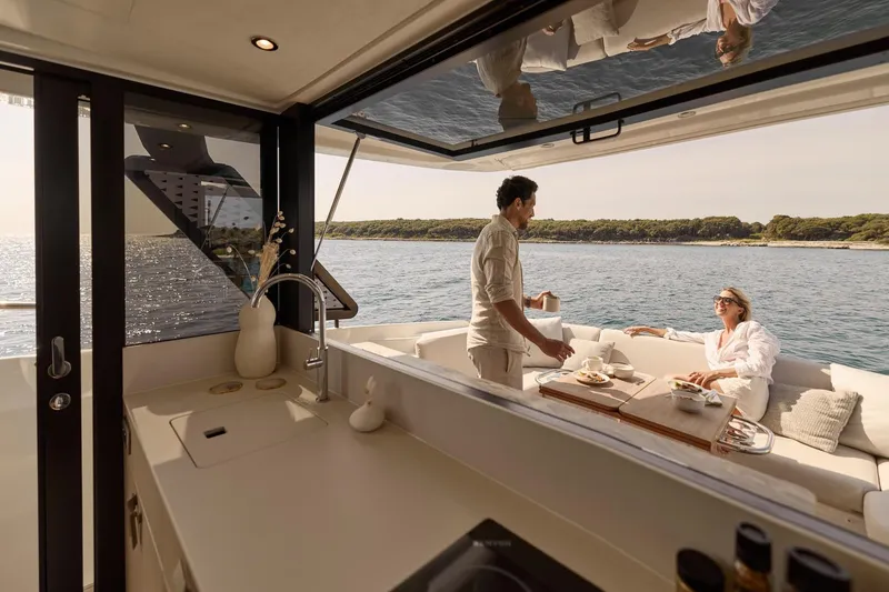 Slide: The Image of Manufacturer Provided Image: Couple enjoying breakfast on a Prestige F4.3 yacht, 2026 model, with ocean view. - 4