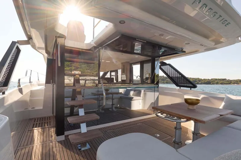 Slide: The Image of Manufacturer Provided Image: Luxurious 2026 Prestige F4.3 yacht interior with modern design and sunlit deck. - 6
