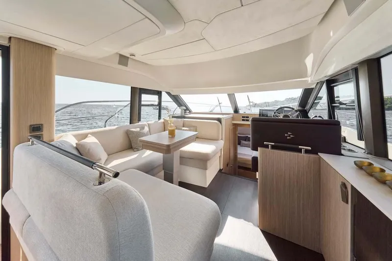 Slide: The Image of Manufacturer Provided Image: Luxurious interior of 2026 Prestige F4.3 yacht with elegant seating and panoramic windows. - 7