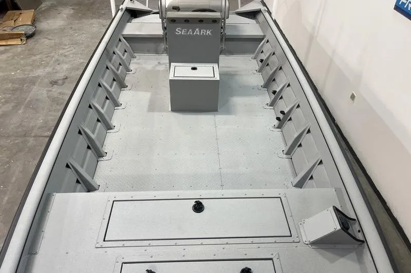 Slide: The Image of 2025 SeaArk 2072 CUB boat interior with spacious deck and storage compartments. - 10