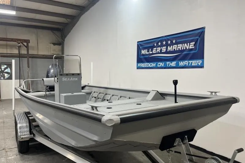 Slide: The Image of 2025 SeaArk 2072 CUB boat on trailer at Miller's Marine showroom. - 2