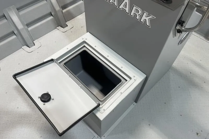 Slide: The Image of Open storage compartment on 2025 SeaArk 2072 CUB boat, showcasing interior space. - 9