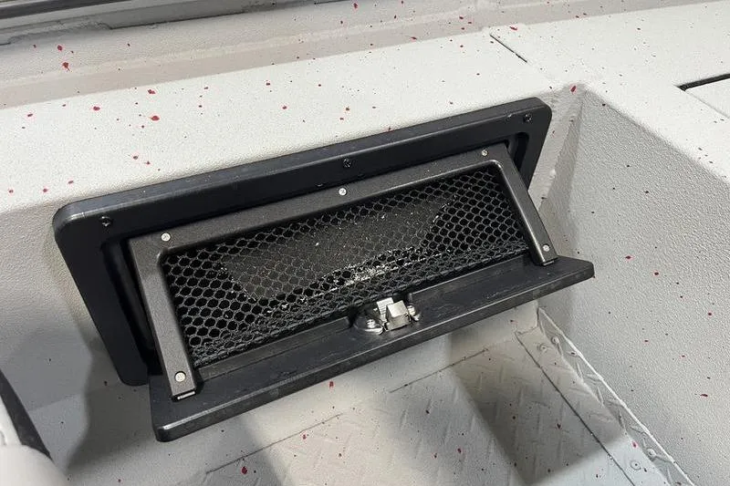 Slide: The Image of Vent detail on 2026 SeaArk Flex 19 Pro boat interior with textured flooring. - 13