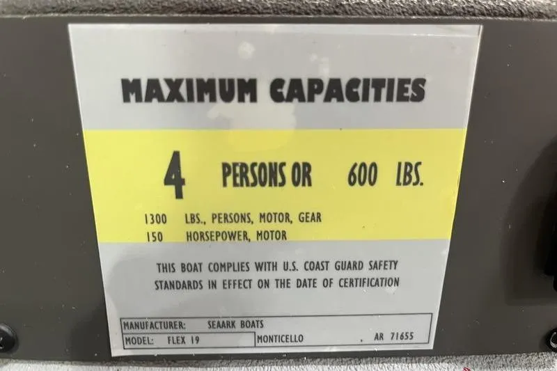 Slide: The Image of Maximum capacity label for 2026 SeaArk Flex 19 Pro boat, 4 persons or 600 lbs. - 18