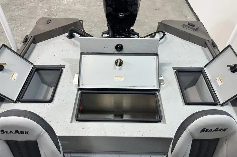 Slide: The Image of 2026 SeaArk Flex 19 Pro boat interior with storage compartments and seating. - 6