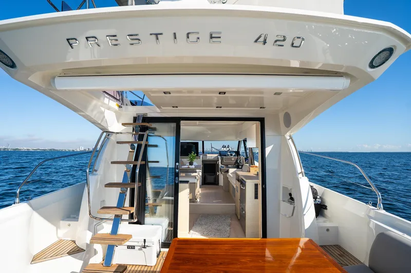 Slide: The Image of Prestige 420 yacht, 2020 model, luxurious interior, open sea view. - 11