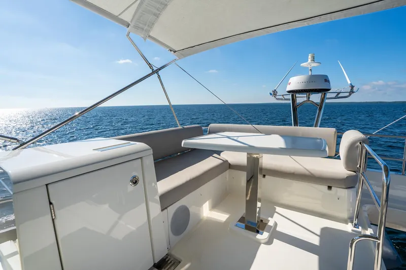 Slide: The Image of Prestige 420 yacht deck, 2020 model, with ocean view and seating area. - 15