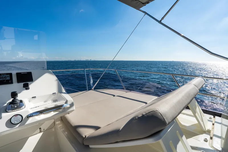 Slide: The Image of Prestige 420 yacht deck with ocean view, 2020 model, sunny day. - 16