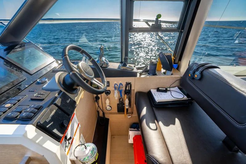 Slide: The Image of Interior of 2020 Prestige 420 yacht cockpit with ocean view. - 27
