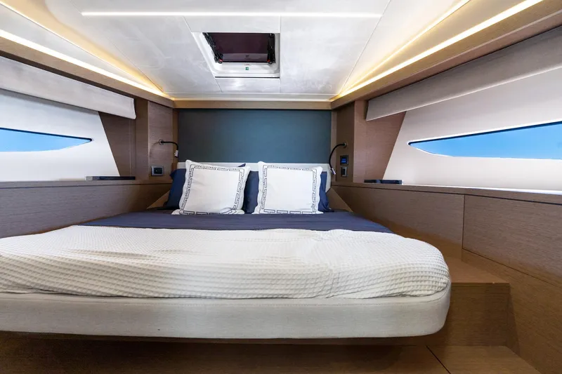 Slide: The Image of Luxurious cabin interior of 2020 Prestige 420 yacht with modern design and comfortable bedding. - 32