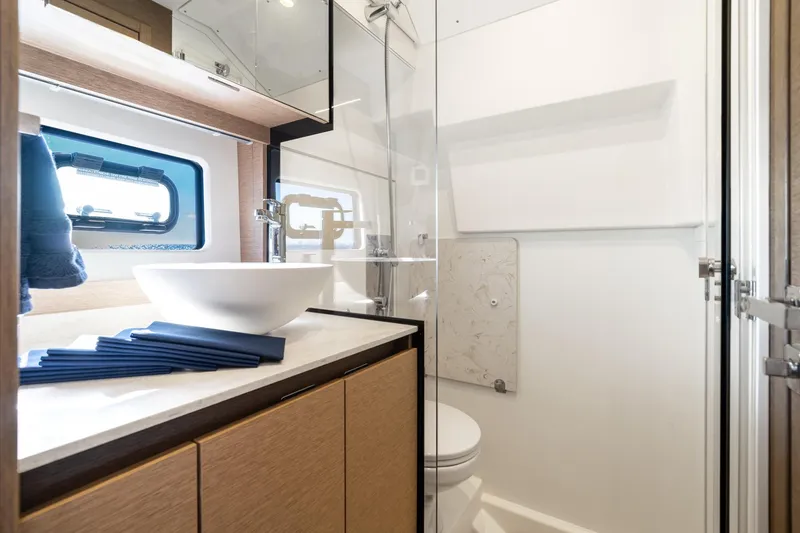 Slide: The Image of Luxurious bathroom in 2020 Prestige 420 yacht with modern fixtures and elegant design. - 33