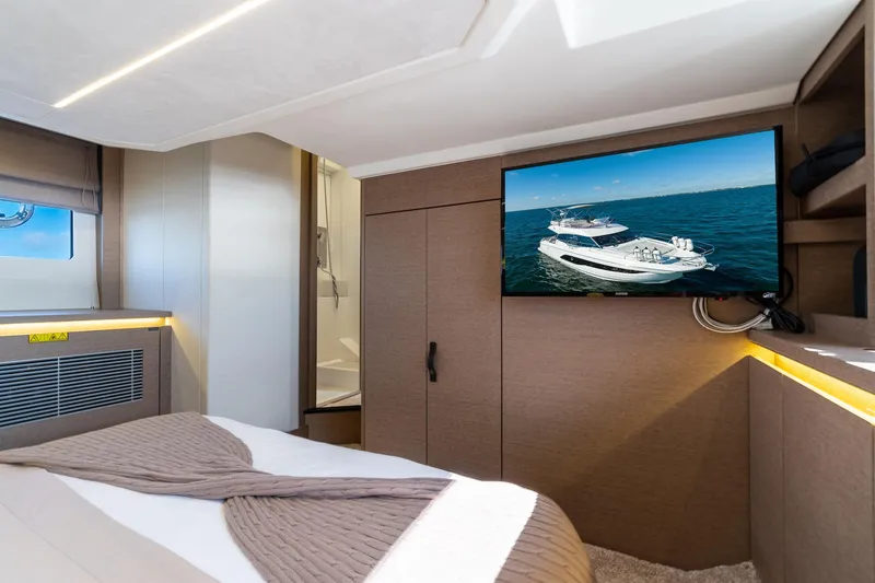 Slide: The Image of Luxurious interior of 2020 Prestige 420 yacht with modern amenities and elegant design. - 38