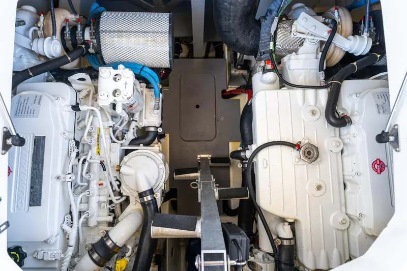 Slide: The Image of Engine room of a 2020 Prestige 420 yacht, showcasing dual engines and components. - 40