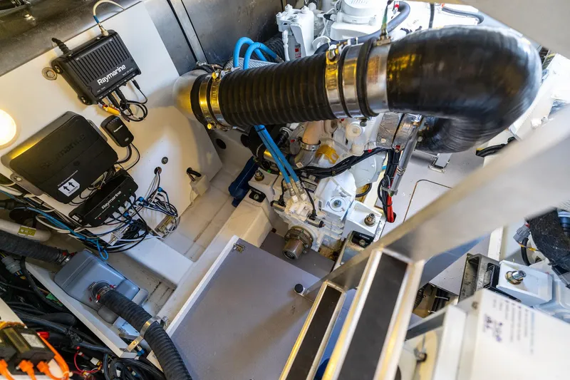 Slide: The Image of Engine room of 2020 Prestige 420 yacht with visible components and wiring. - 46
