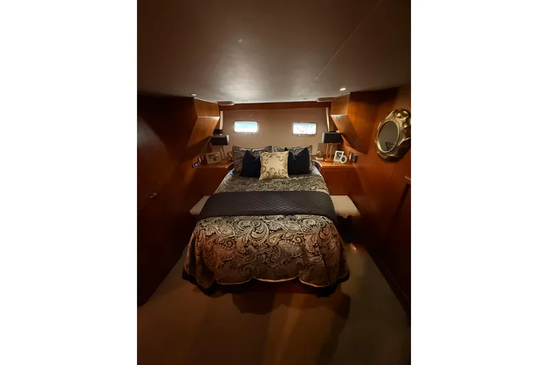 Slide: The Image of Luxurious bedroom interior of 1997 Ocean Alexander 486 Pilothouse yacht. - 24