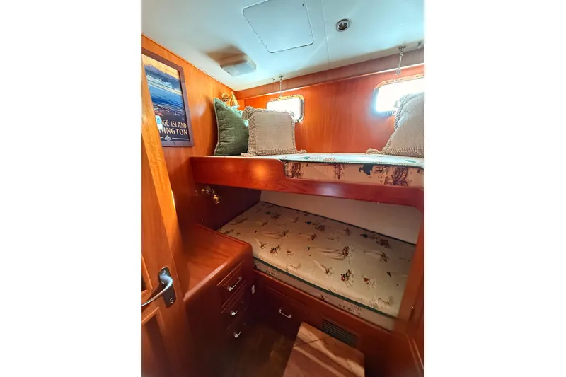 Slide: The Image of Cozy cabin with bunk beds in 1997 Ocean Alexander 486 Pilothouse yacht. - 31