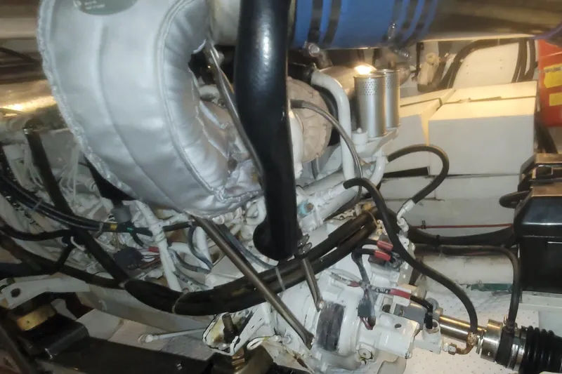 Slide: The Image of 1997 Ocean Alexander 486 Pilothouse yacht docked at marina, side view. - 36