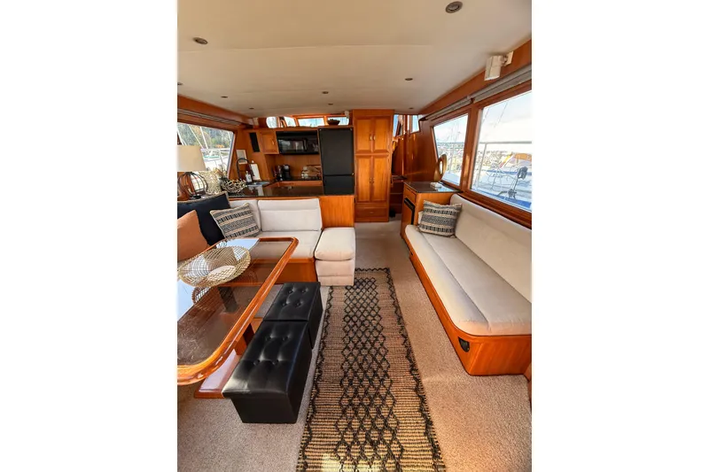 Slide: The Image of Luxurious interior of 1997 Ocean Alexander 486 Pilothouse yacht with elegant seating and decor. - 5