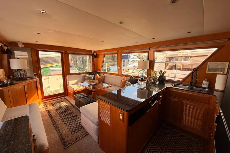 Slide: The Image of Luxurious interior of 1997 Ocean Alexander 486 Pilothouse yacht with elegant furnishings. - 9