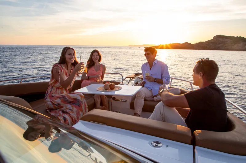 Slide: The Image of People enjoying sunset on a Jeanneau TH33 yacht, 2026. - 12