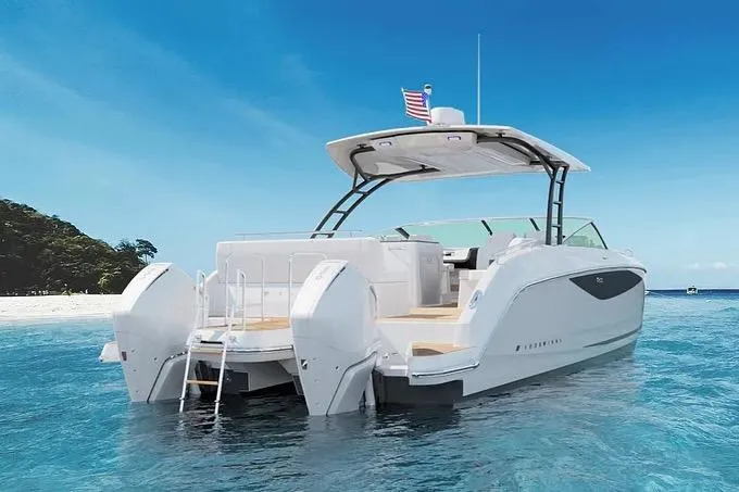 Slide: The Image of Manufacturer Provided Image: 2026 Four Winns TH33 boat on clear blue water, featuring sleek design and twin engines. - 2
