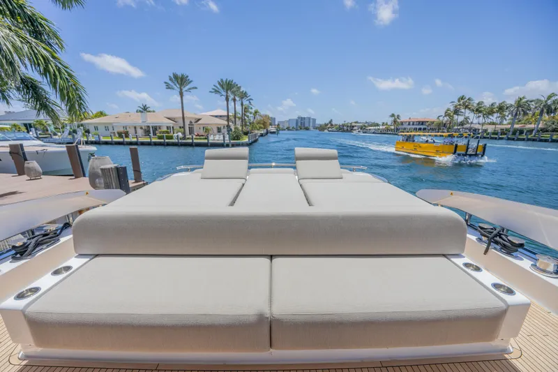 Slide: The Image of Luxurious 2023 Azimut S8 yacht with spacious sunbathing deck on a sunny waterfront. - 15