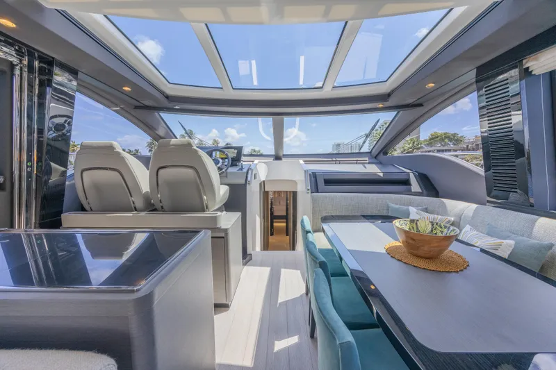 Slide: The Image of Luxurious interior of 2023 Azimut S8 yacht with panoramic windows and modern seating. - 34