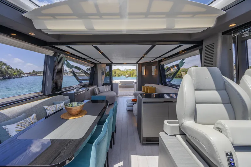 Slide: The Image of Luxurious interior of 2023 Azimut S8 yacht with modern seating and panoramic windows. - 37