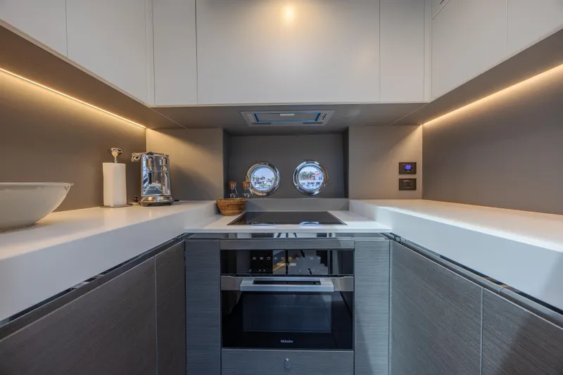 Slide: The Image of Modern kitchen interior of 2023 Azimut S8 yacht with sleek design and appliances. - 45