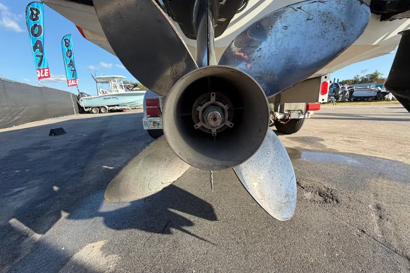 Slide: The Image of Close-up of a 1999 Black Thunder XT-430 boat propeller at a boat sale event. - 3
