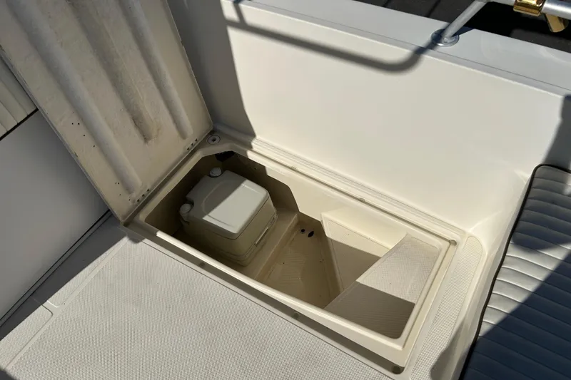 Slide: The Image of Storage compartment in 1995 Sea Cat 255 center console boat. - 15